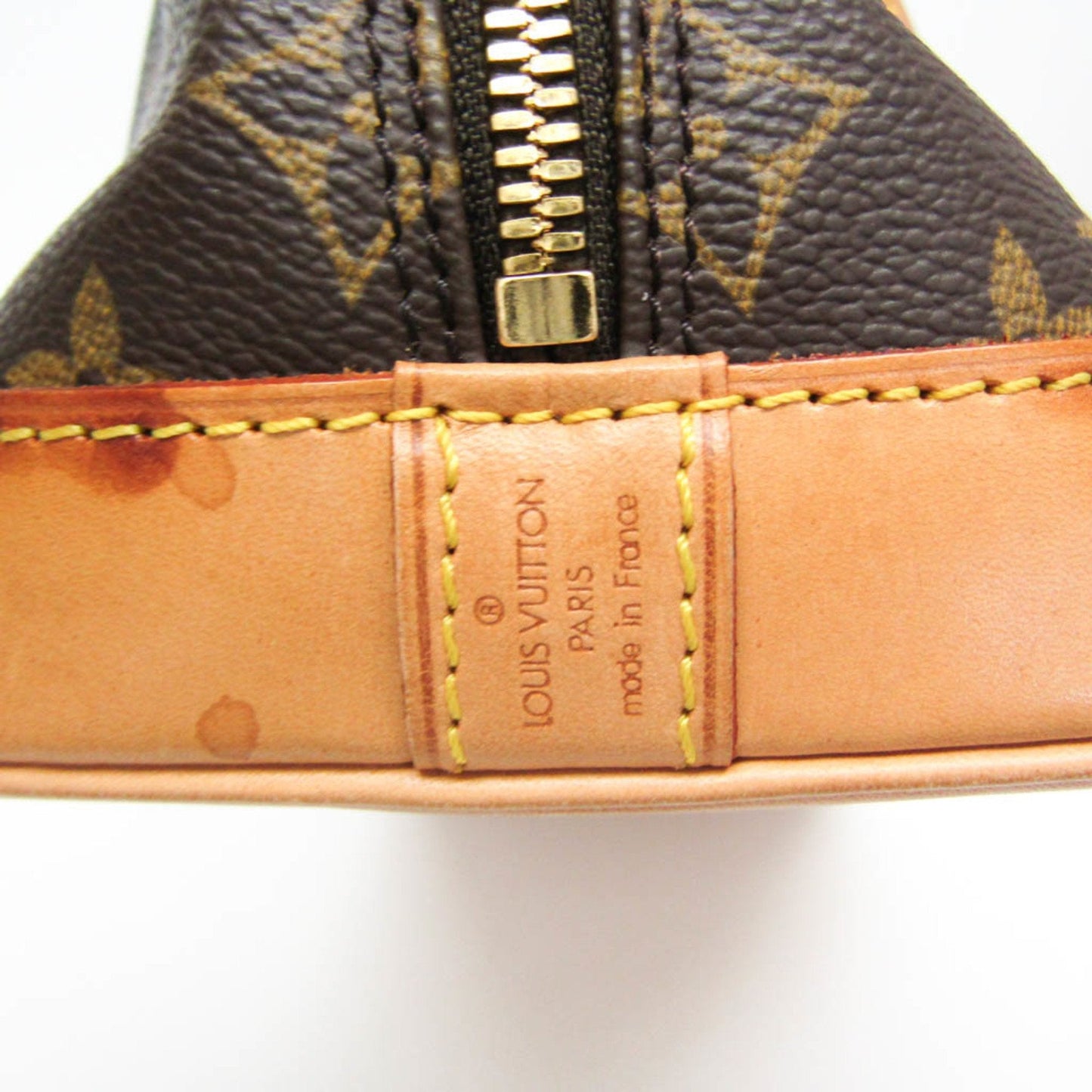 Louis Vuitton Alma Brown Canvas Handbag