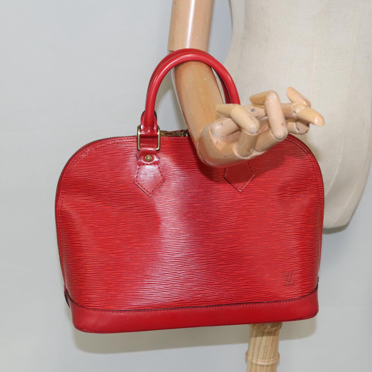 Louis Vuitton Alma Red Leather Handbag