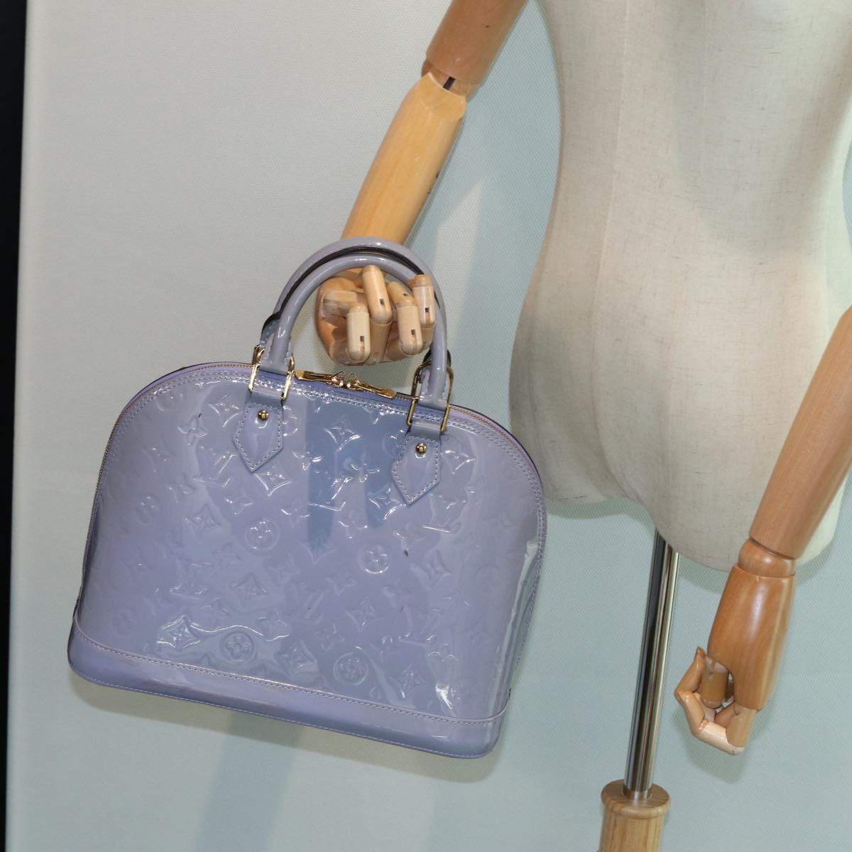 Louis Vuitton Alma Black Patent Leather Handbag