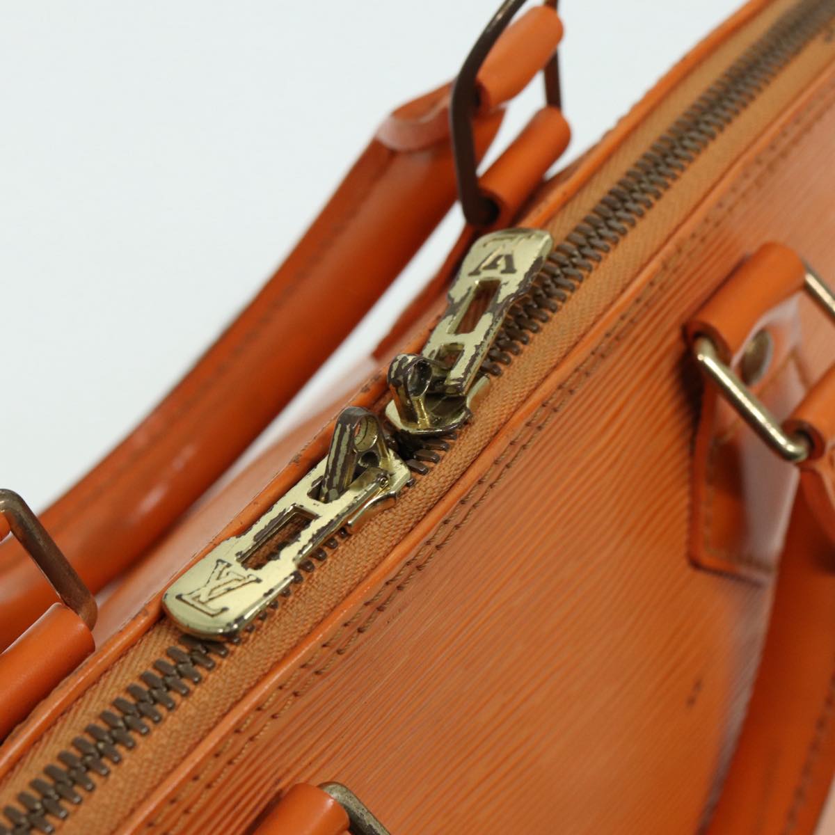 Louis Vuitton Alma Orange Leather Handbag