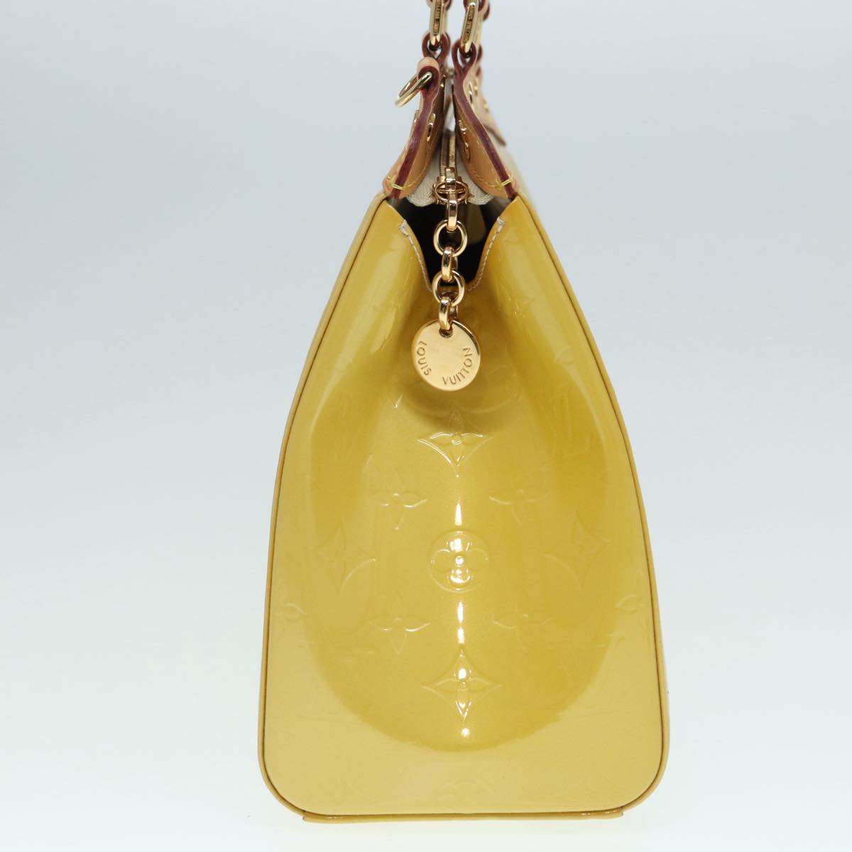 Louis Vuitton Brea Yellow Patent Leather Handbag