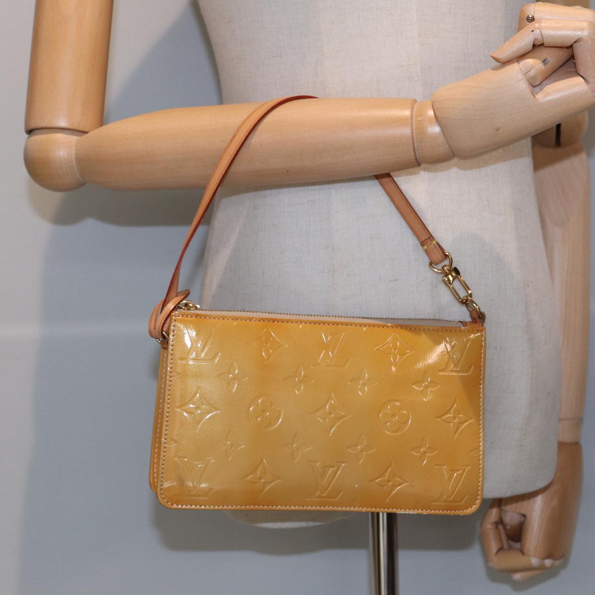 Louis Vuitton Lexington Beige Patent Leather Clutch Bag