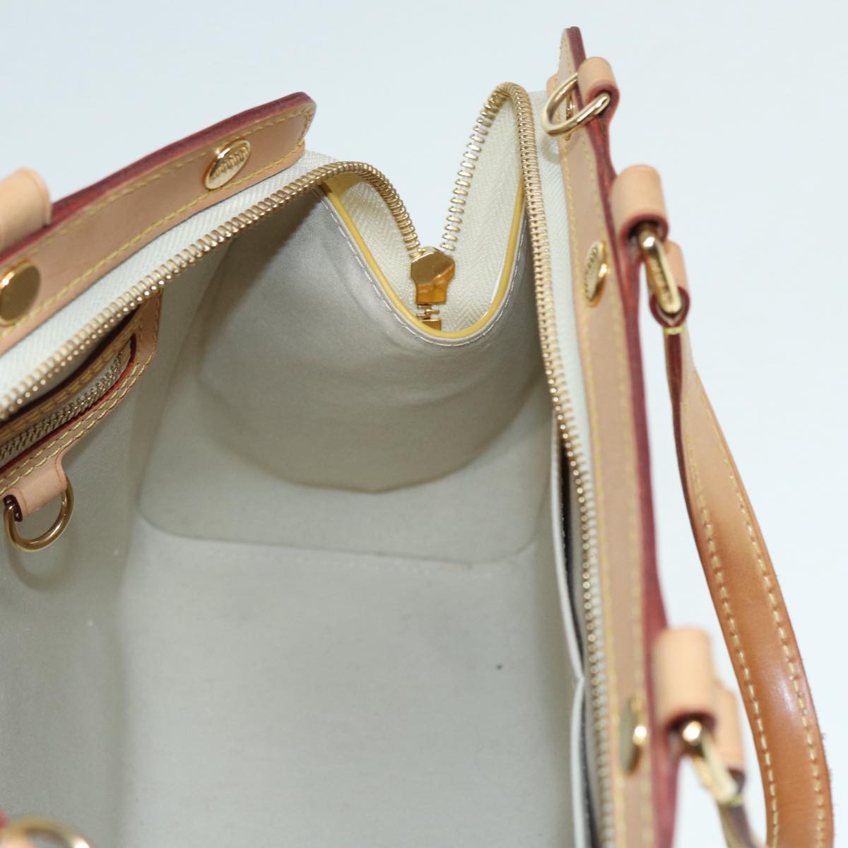 Louis Vuitton Brea Yellow Patent Leather Handbag