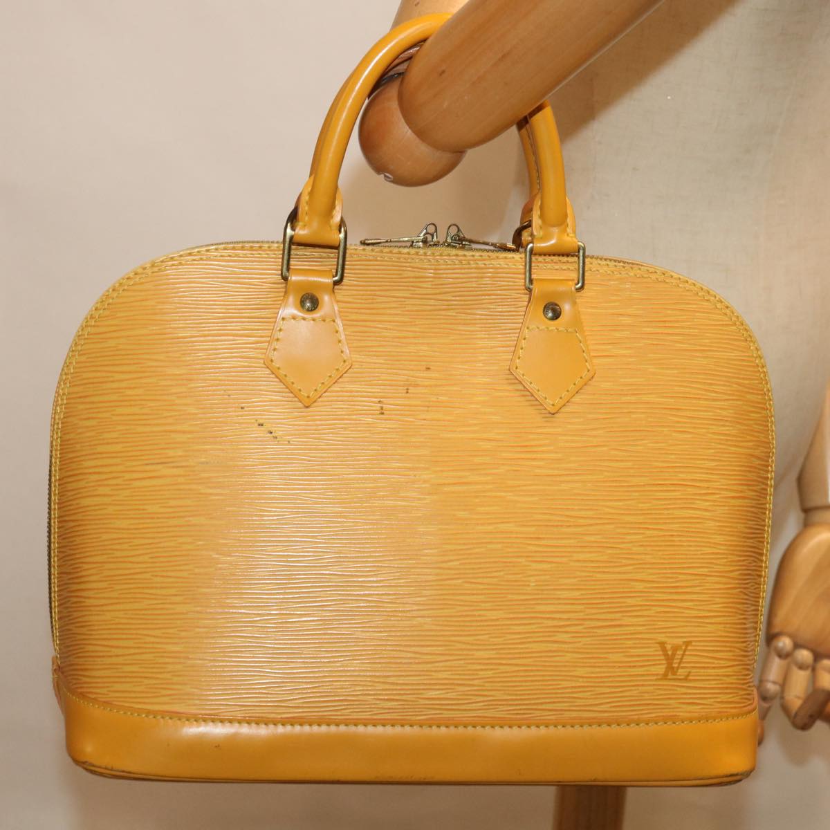 Louis Vuitton Alma Yellow Leather Handbag