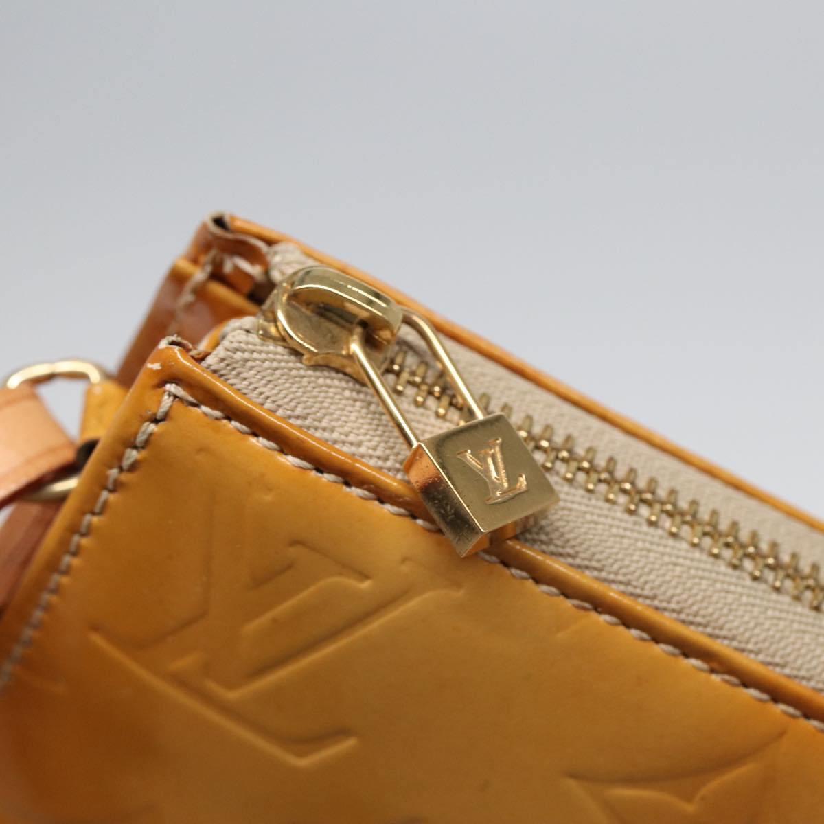 Louis Vuitton Lexington Beige Patent Leather Clutch Bag