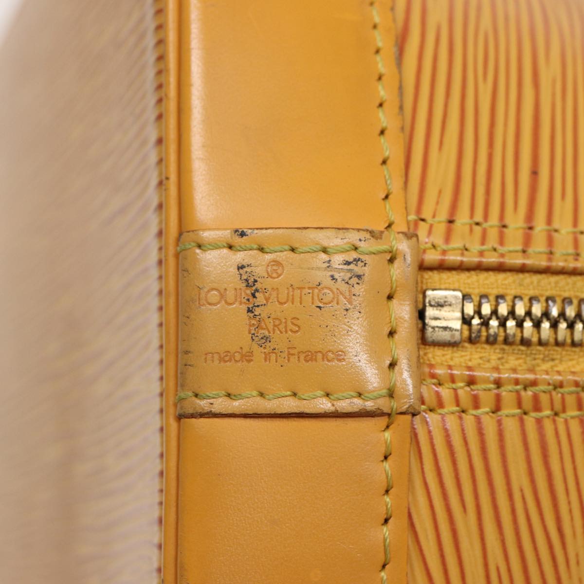 Louis Vuitton Alma Yellow Leather Handbag