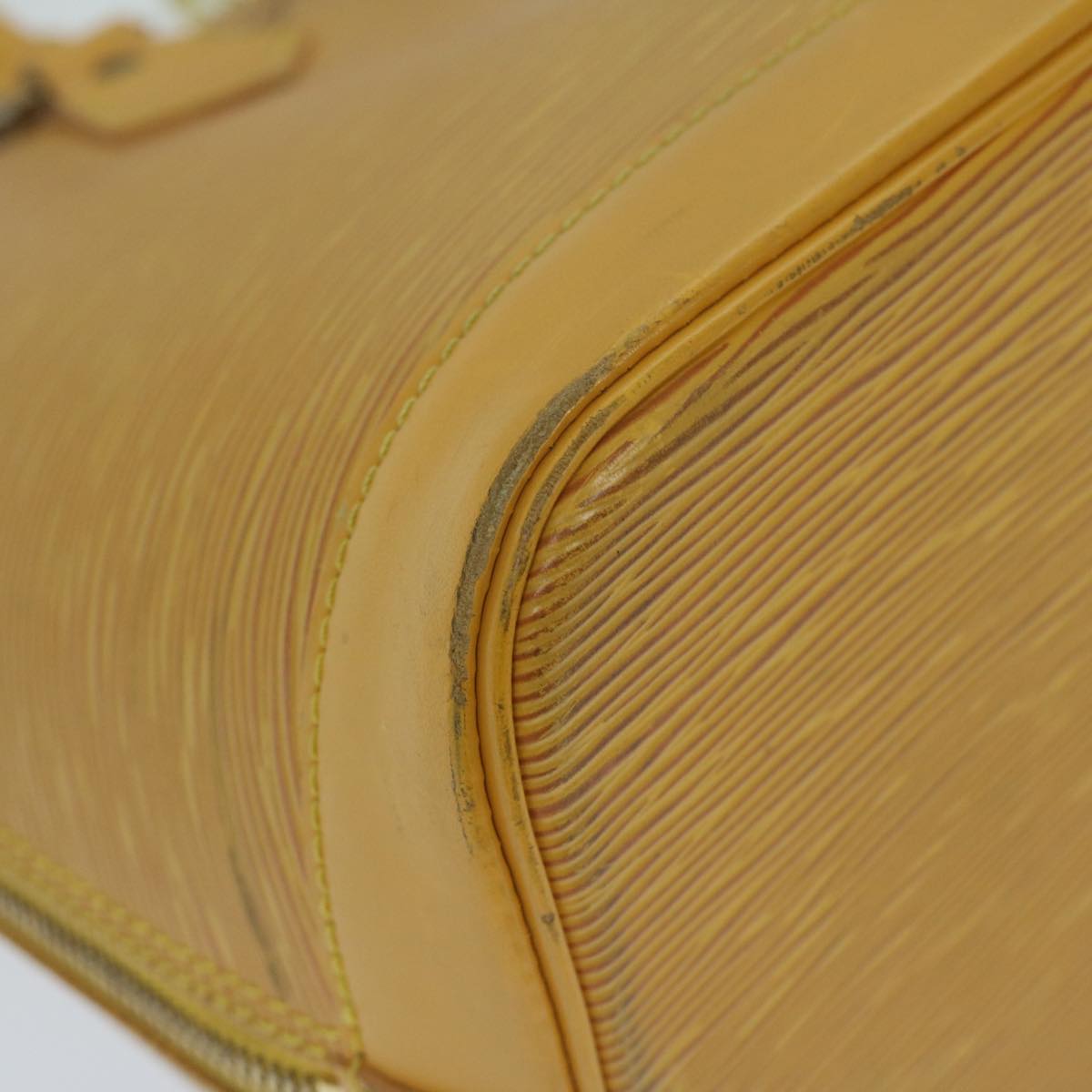 Louis Vuitton Alma Yellow Leather Handbag
