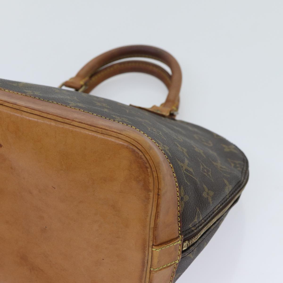 Louis Vuitton Alma Brown Canvas Handbag