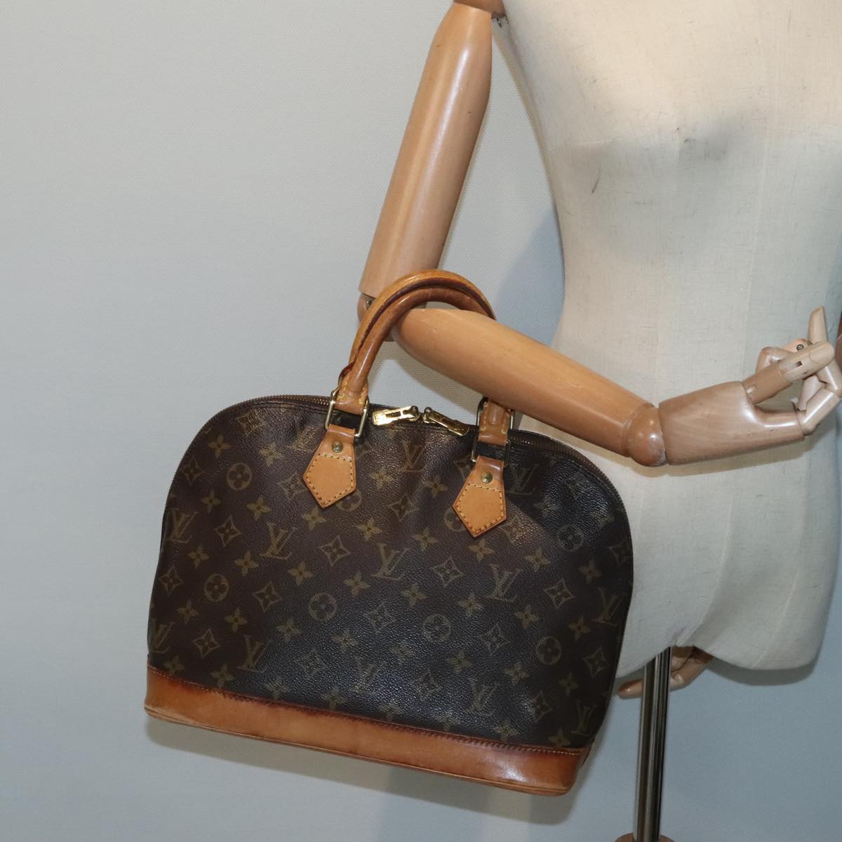 Louis Vuitton Alma Brown Canvas Handbag