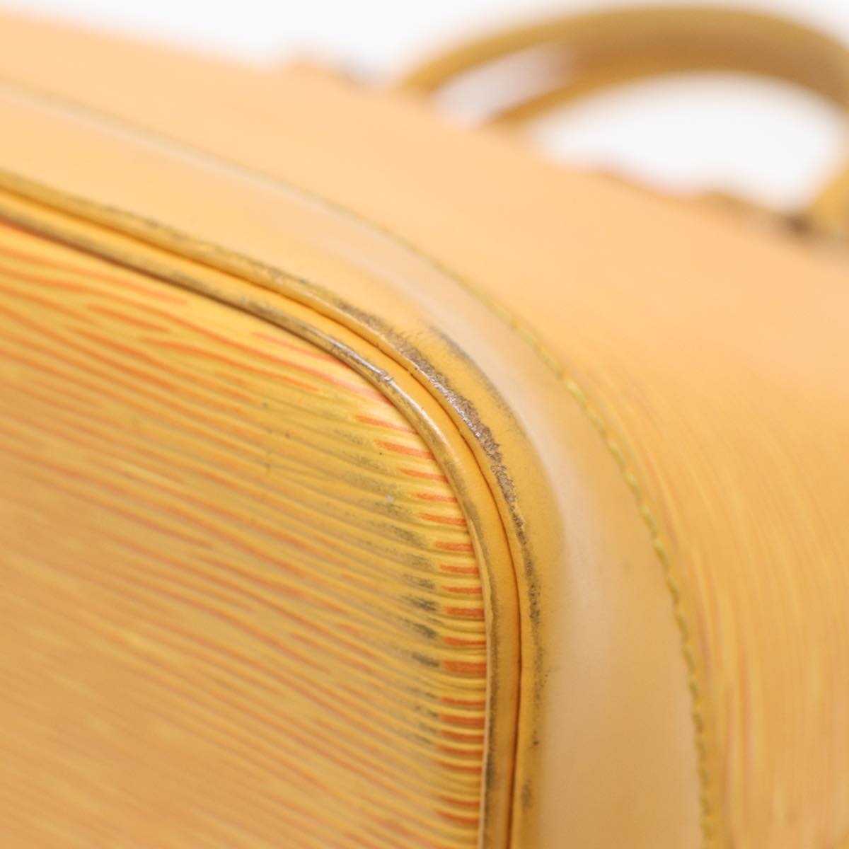 Louis Vuitton Alma Yellow Leather Handbag