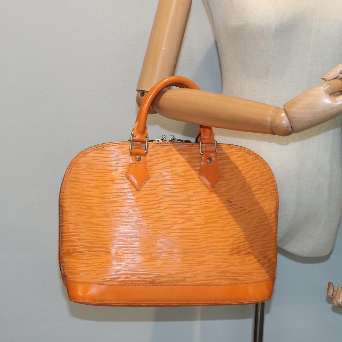 Louis Vuitton Alma Orange Leather Handbag