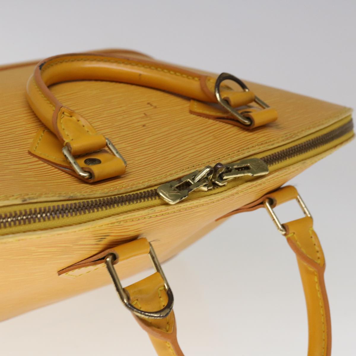Louis Vuitton Alma Yellow Leather Handbag