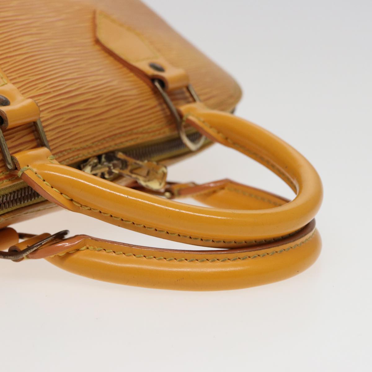 Louis Vuitton Alma Yellow Leather Handbag