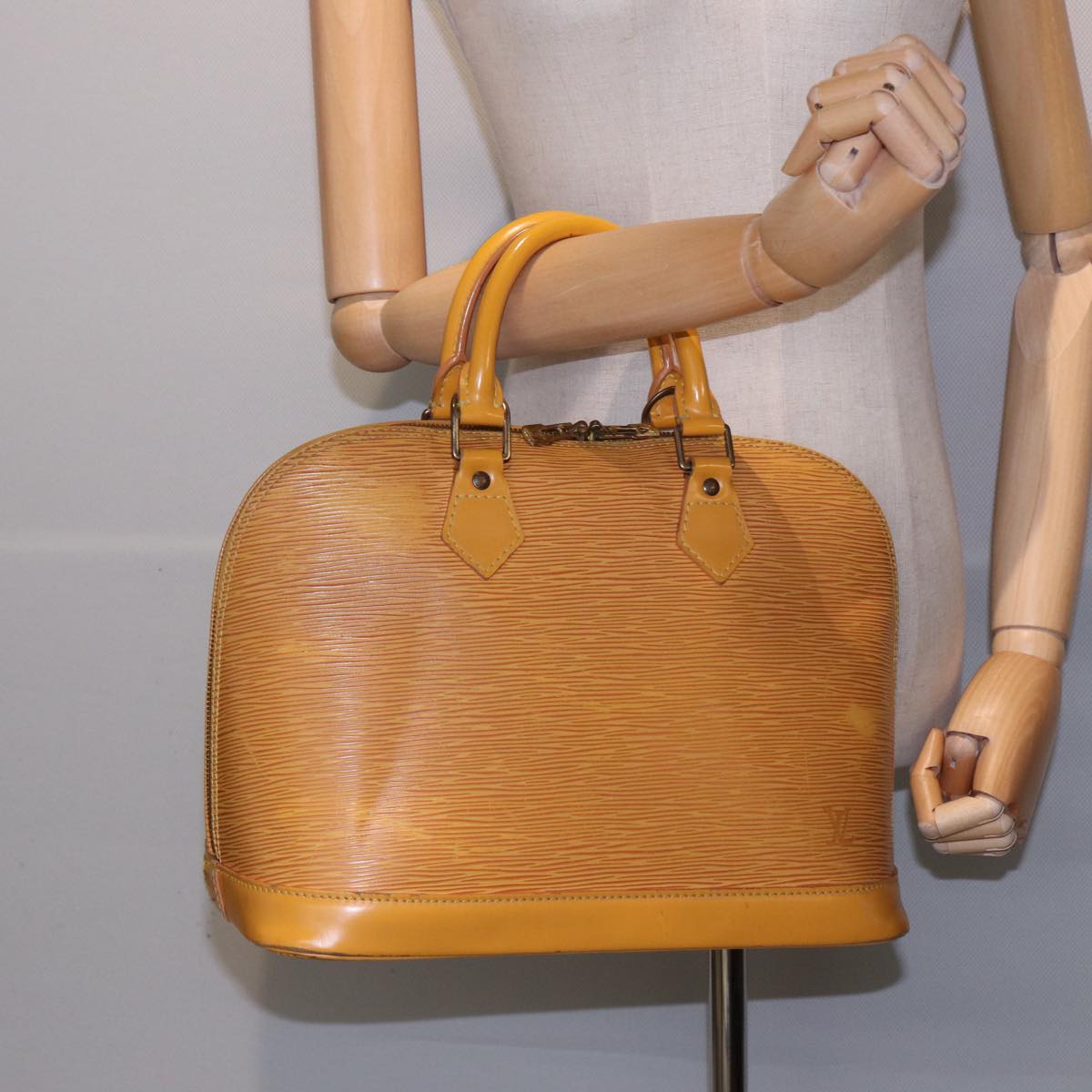 Louis Vuitton Alma Yellow Leather Handbag