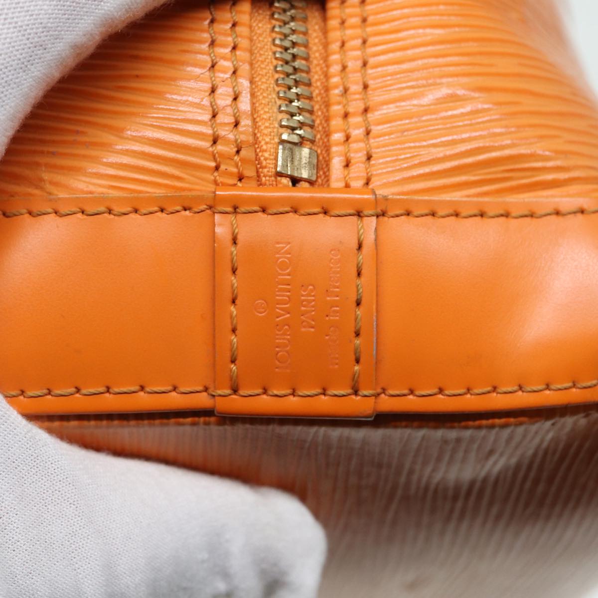 Louis Vuitton Alma Orange Leather Handbag