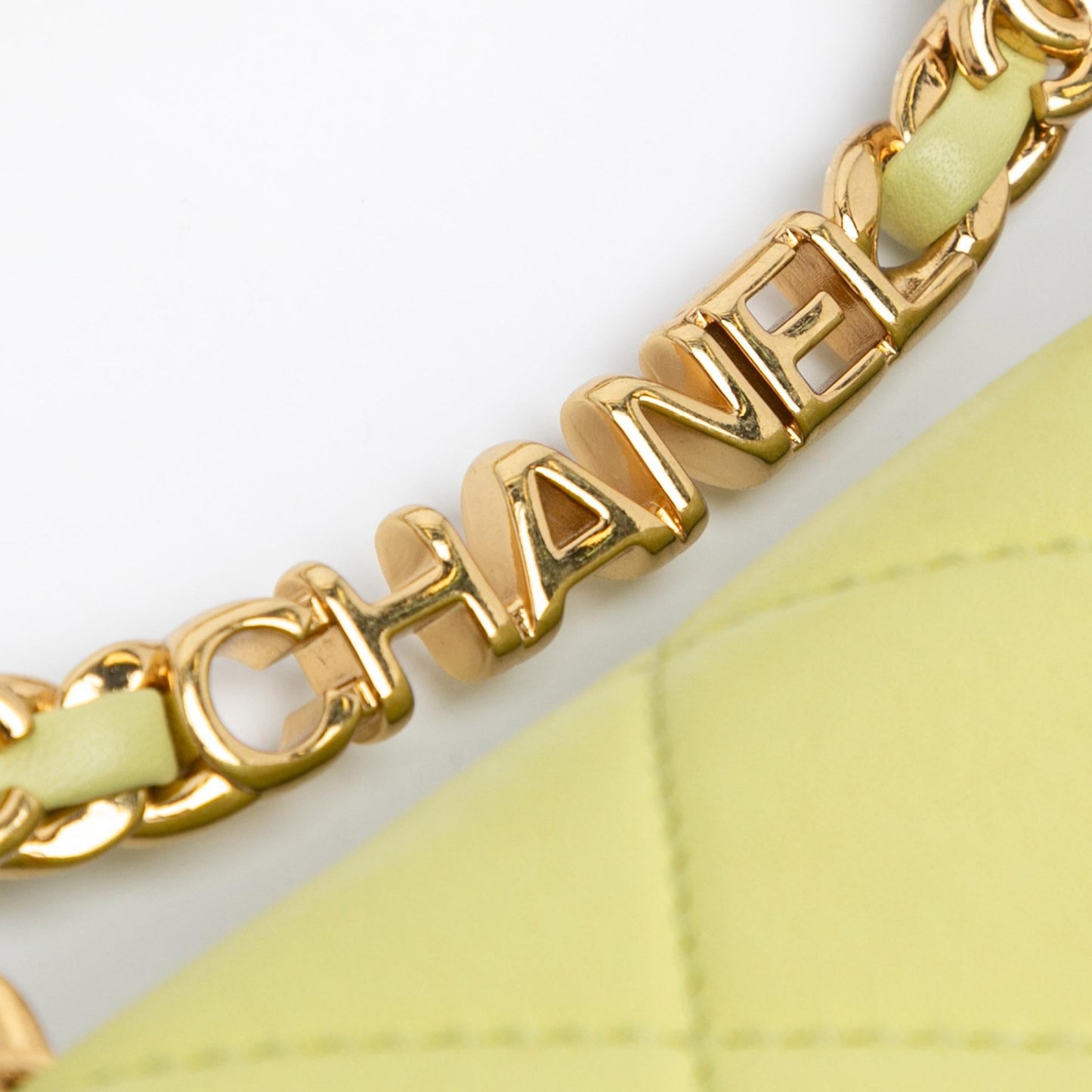 Chanel Mini Quilted Lambskin Oval Logo Chain Top Handle Flap