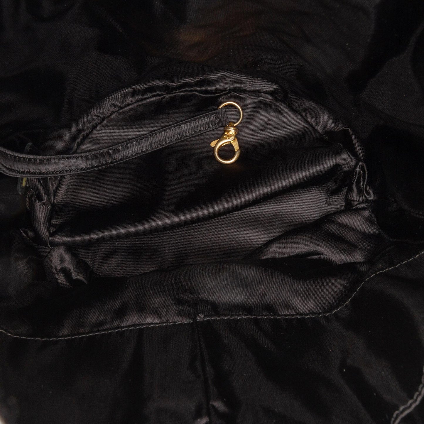 Chanel Quilted Nylon Crystal CC Drawstring Sling Bag
