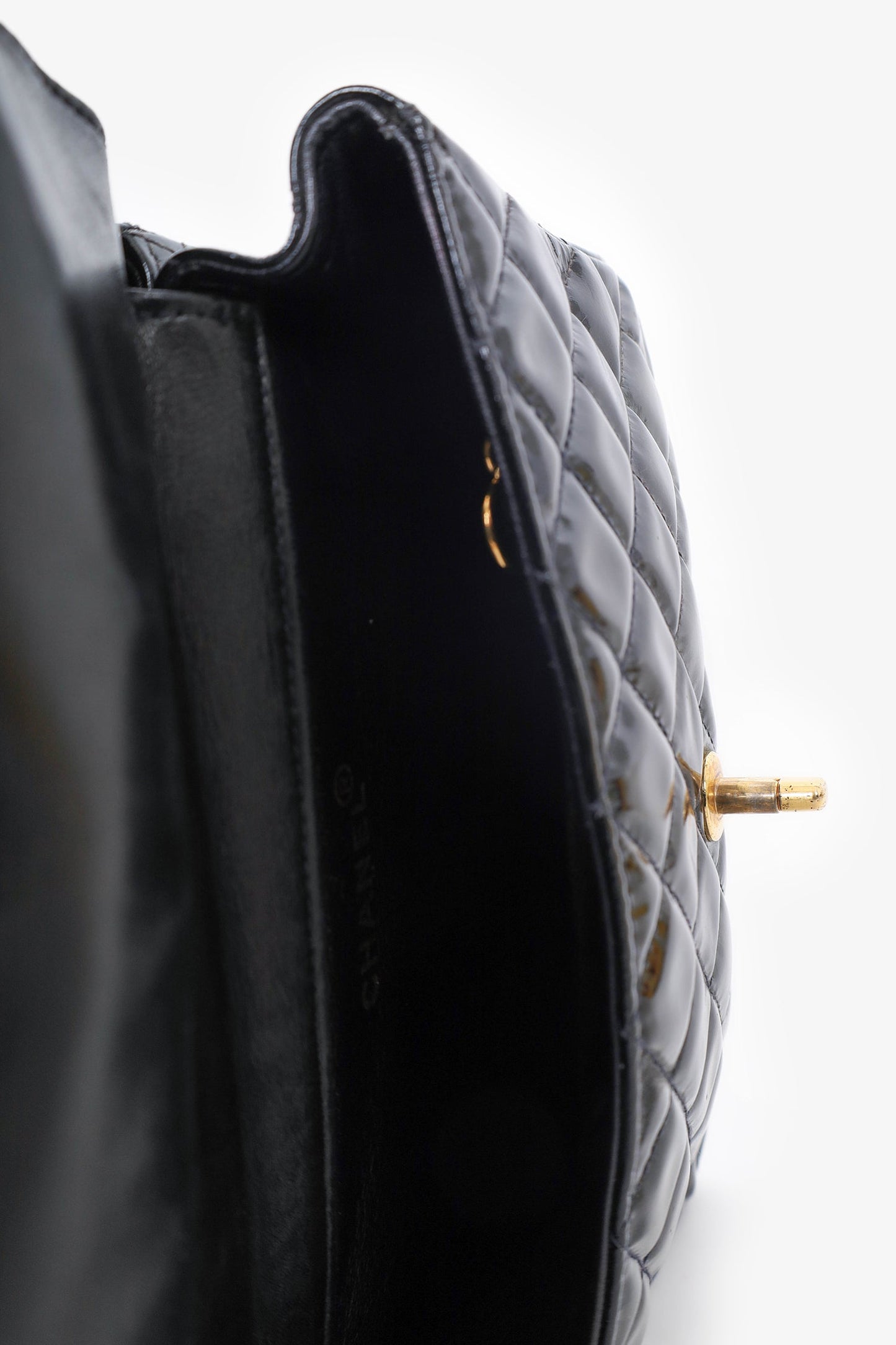 Pre-Loved Chanel™ 1996-97 Black Quilted Patent Double Sided Flap Bag
