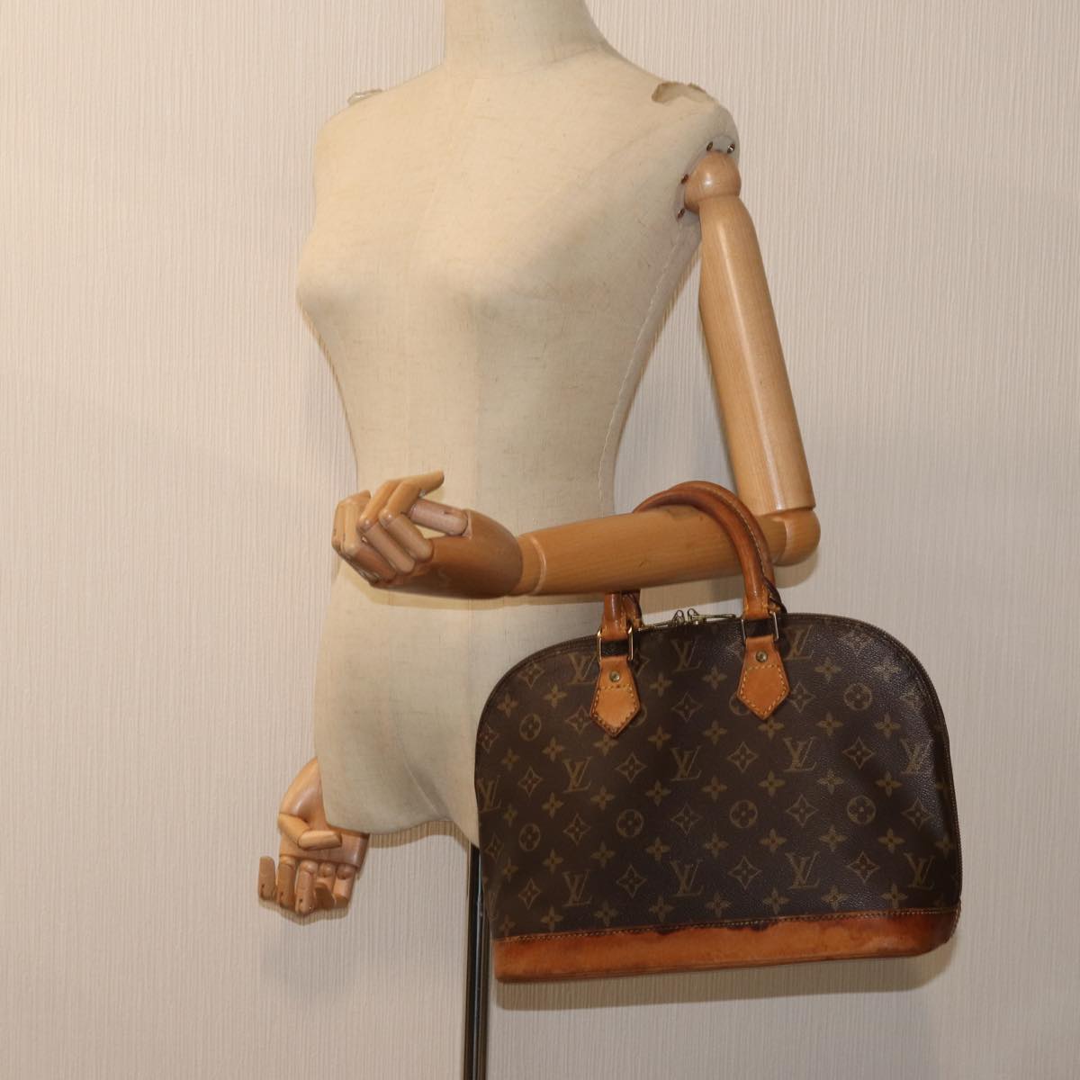 Louis Vuitton Alma Brown Canvas Handbag