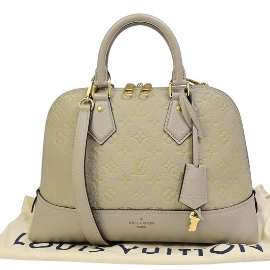 Louis Vuitton Neo Alma Ecru Gold Plated Handbag ()
