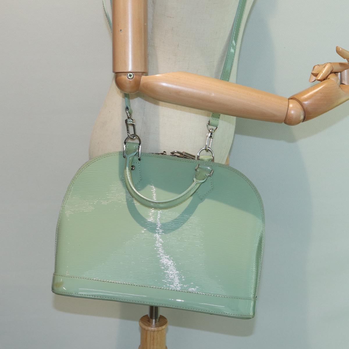 Louis Vuitton Alma Green Leather Handbag