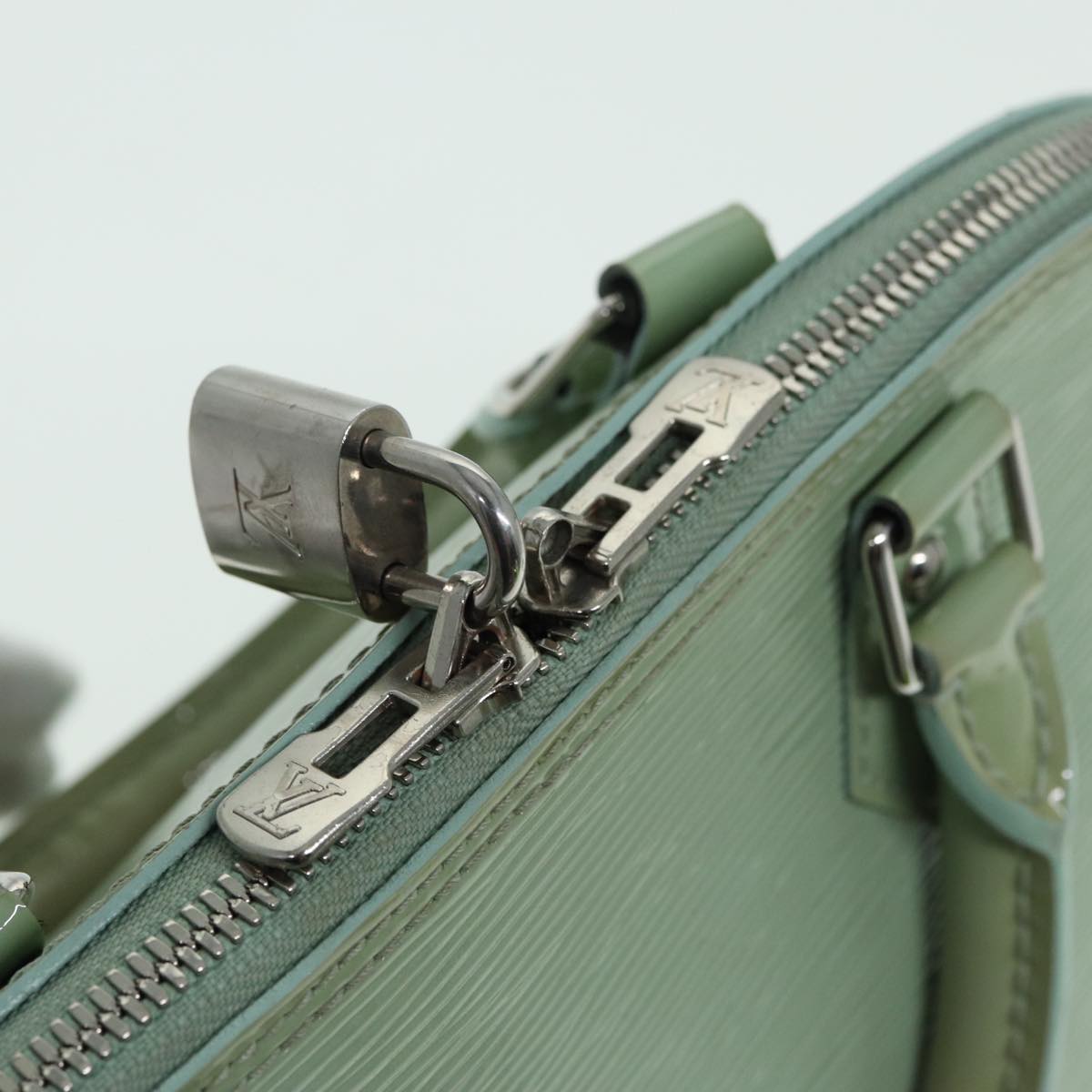 Louis Vuitton Alma Green Leather Handbag