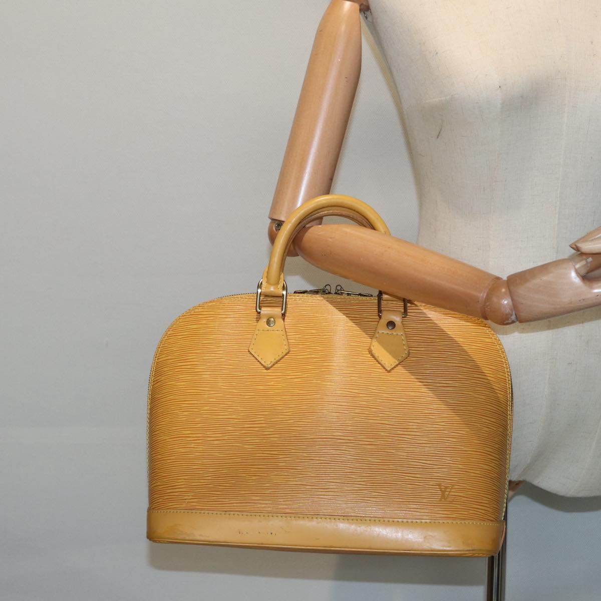 Louis Vuitton Alma Yellow Leather Handbag