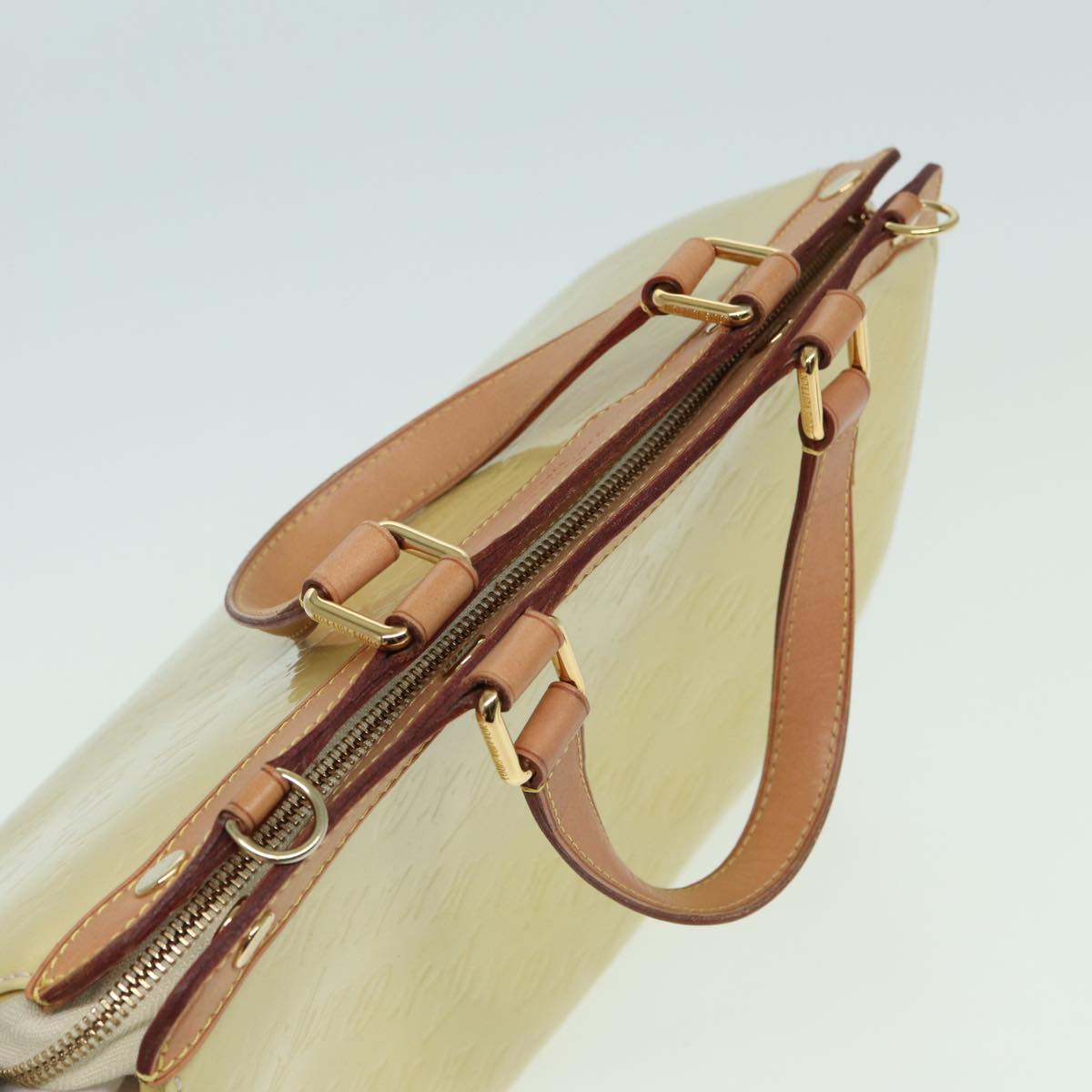 Louis Vuitton Brea Yellow Patent Leather Handbag
