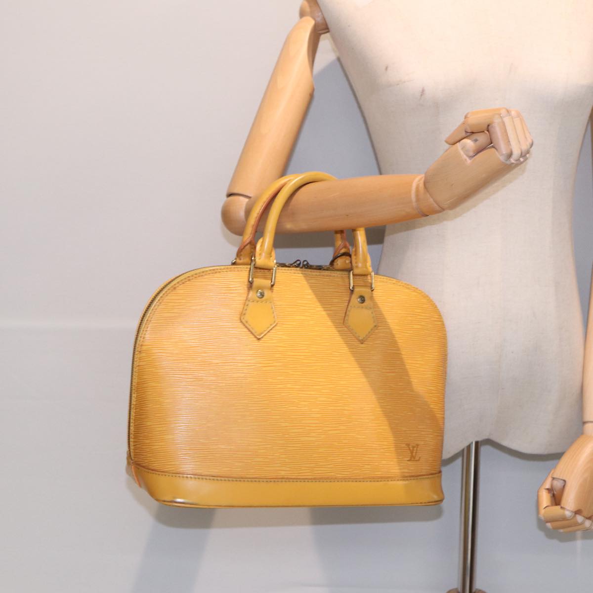 Louis Vuitton Alma Yellow Leather Handbag