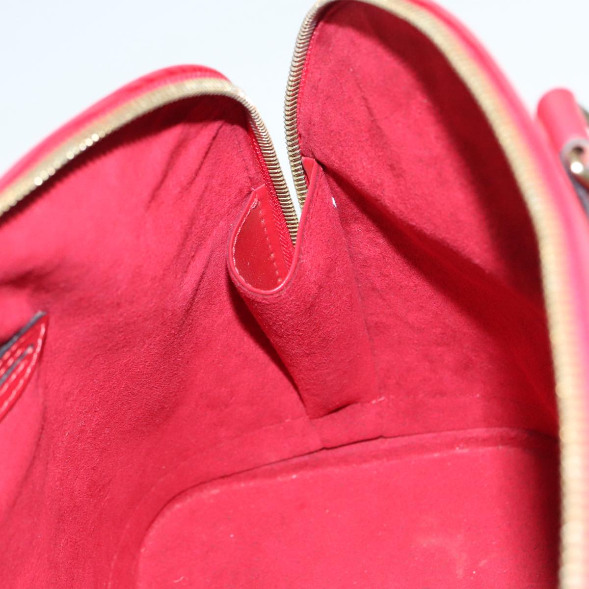 Louis Vuitton Alma Red Leather Handbag