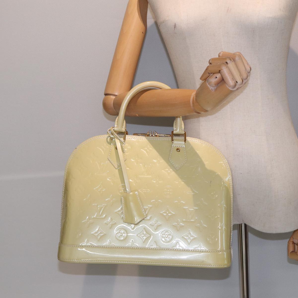 Louis Vuitton Alma Ecru Patent Leather Handbag