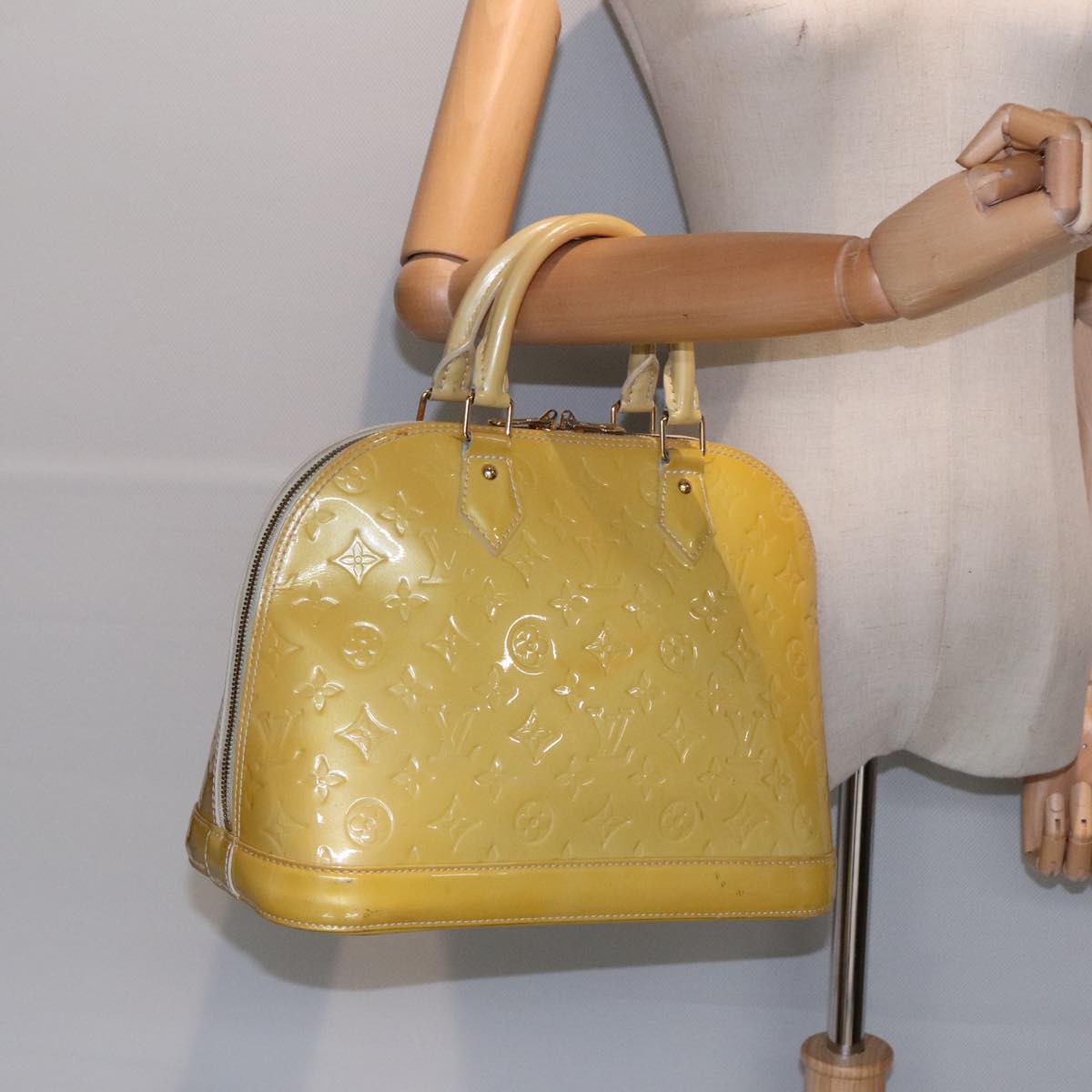 Louis Vuitton Alma Yellow Patent Leather Handbag