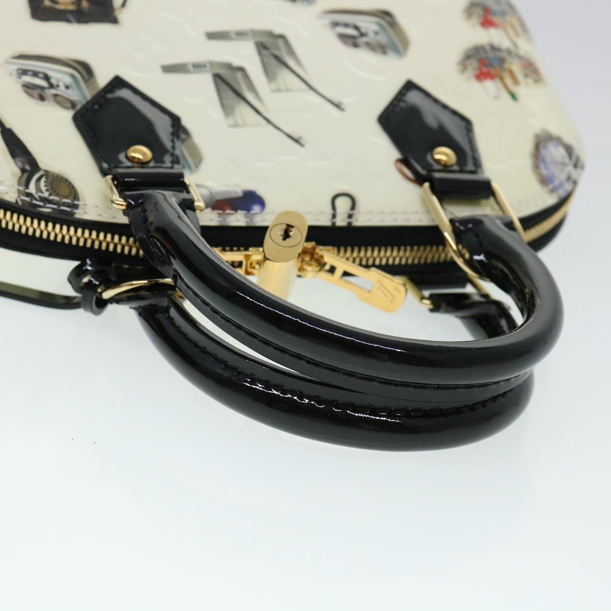 Louis Vuitton Alma White Patent Leather Handbag