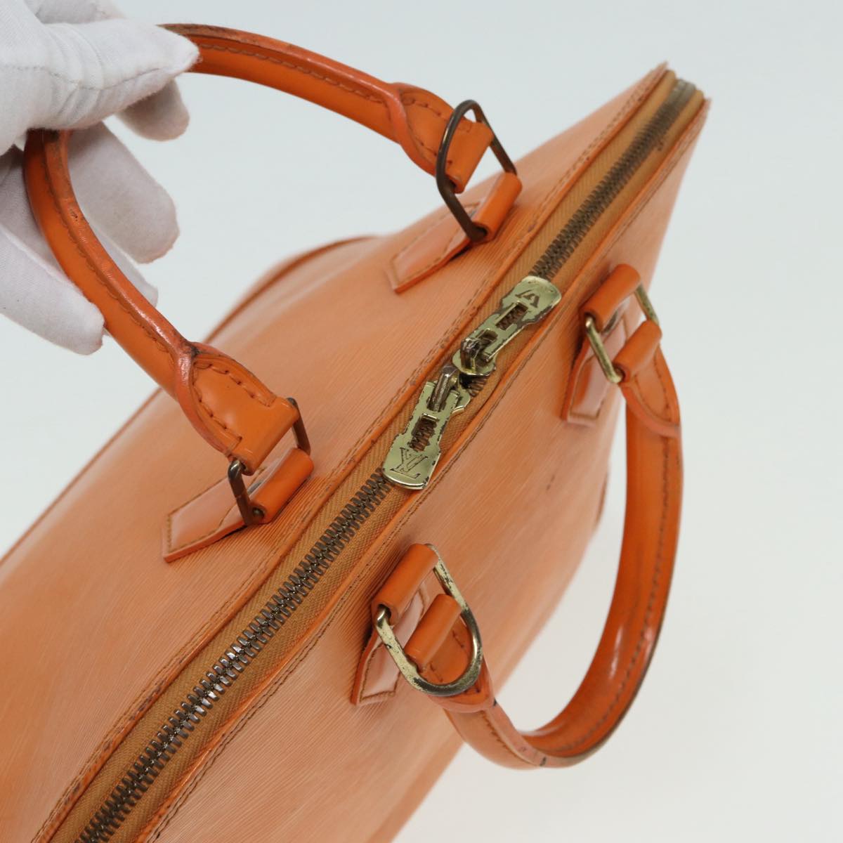 Louis Vuitton Alma Orange Leather Handbag