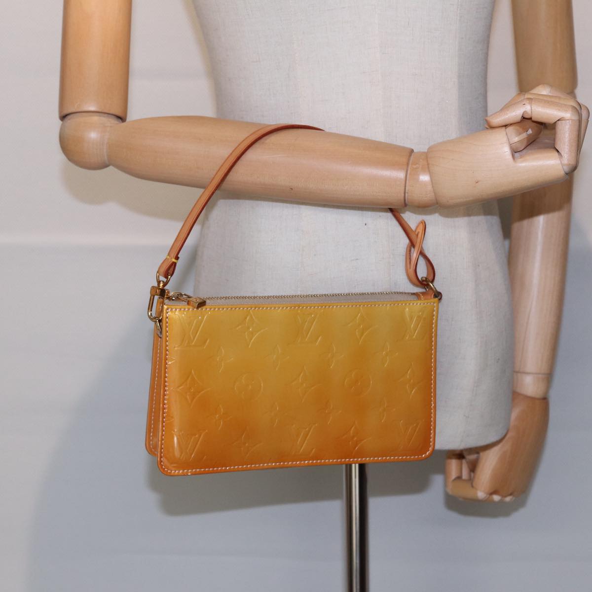 Louis Vuitton Lexington Beige Patent Leather Clutch Bag