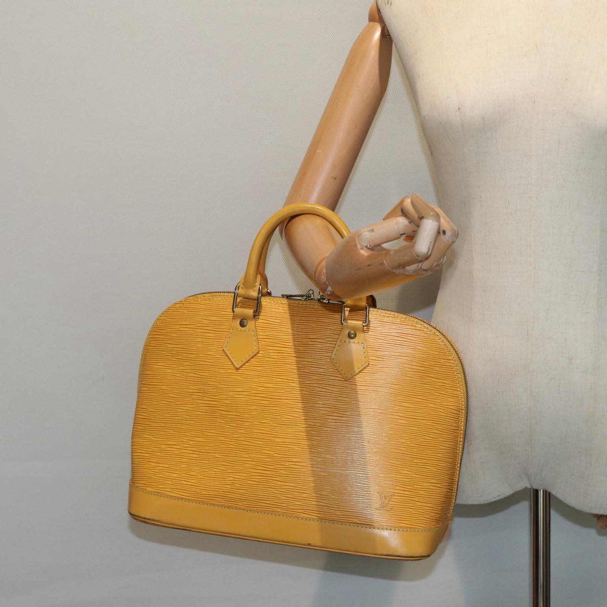 Louis Vuitton Alma Yellow Leather Handbag