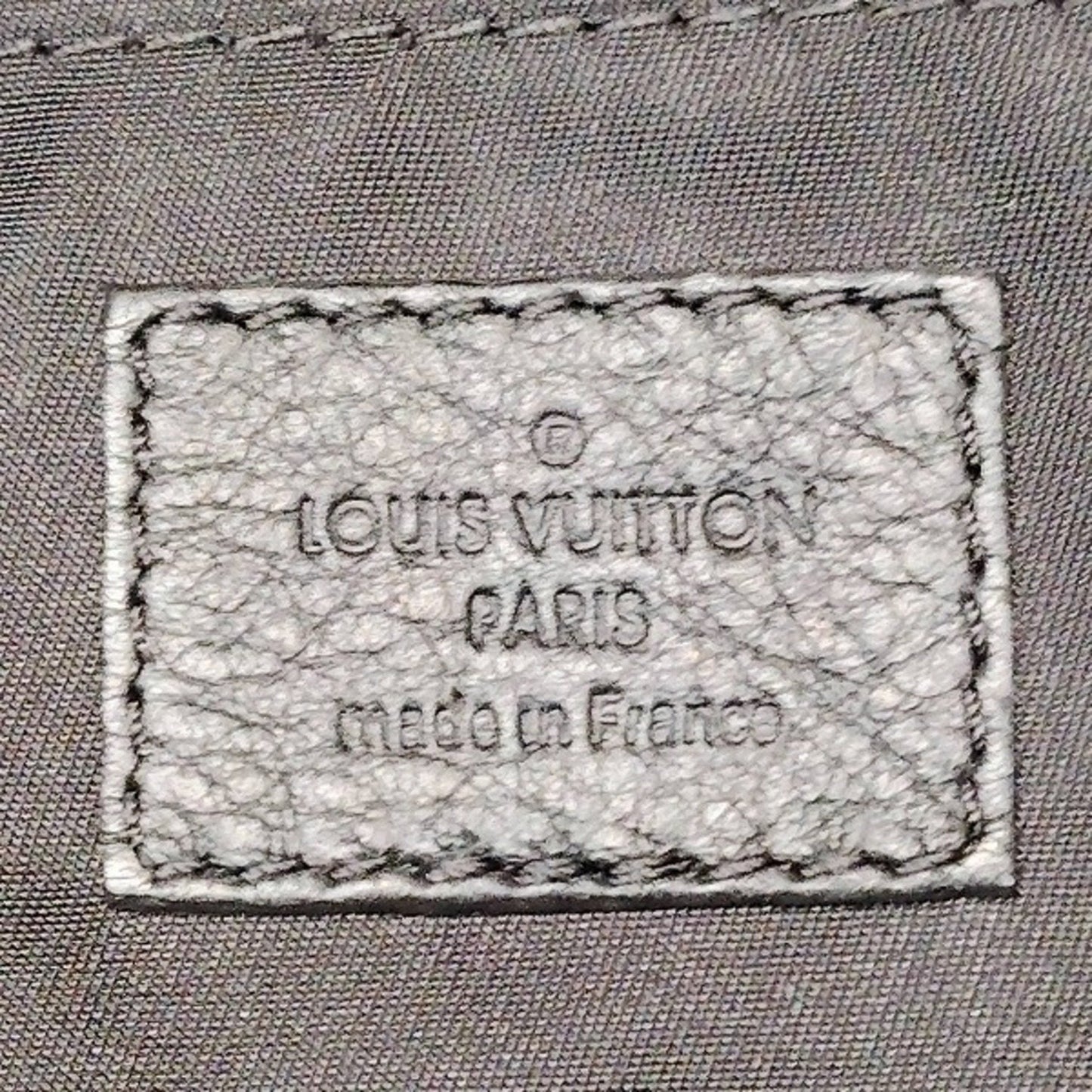 Louis Vuitton Leopard Leather Backpack
