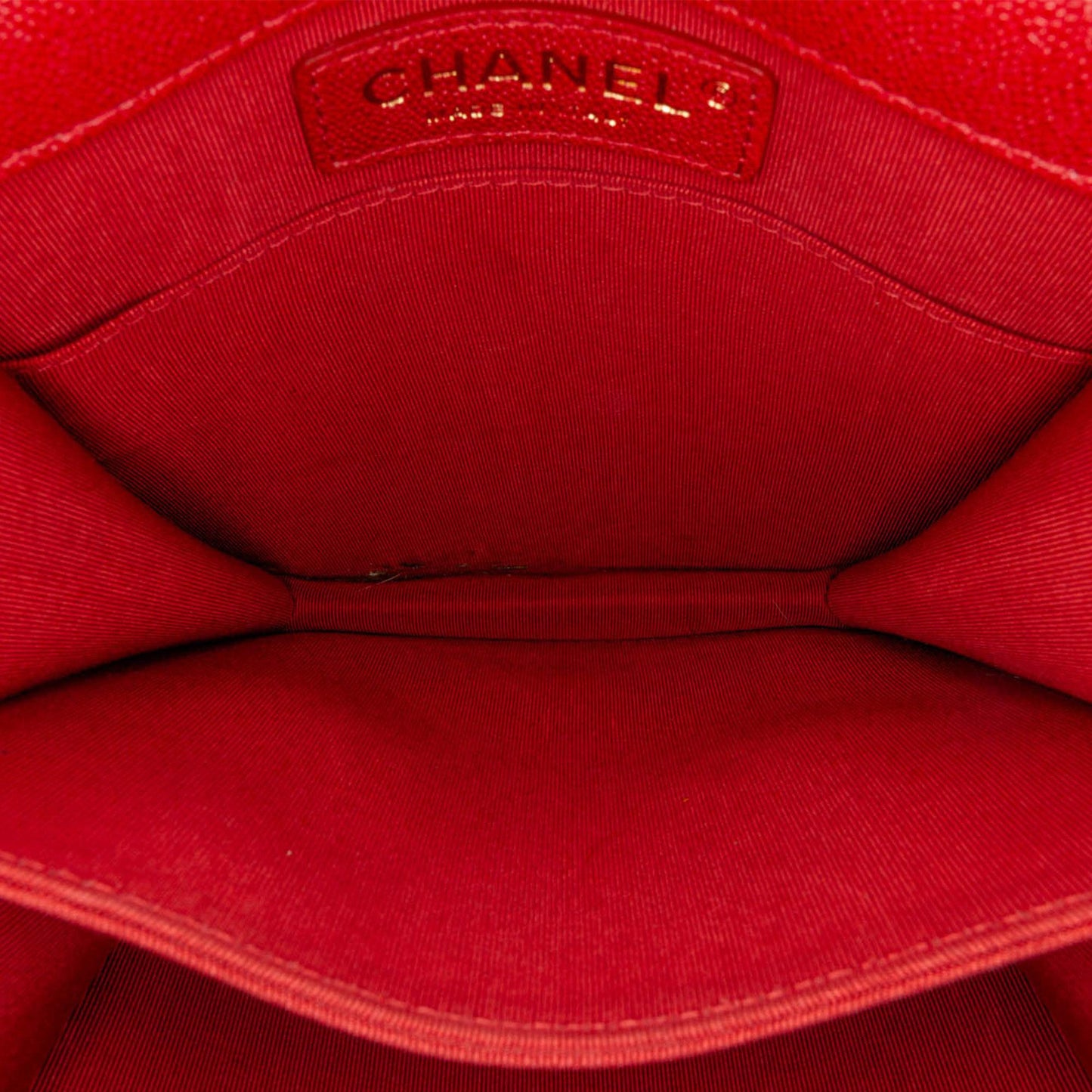 Chanel Quilted Caviar North South Boy Flap