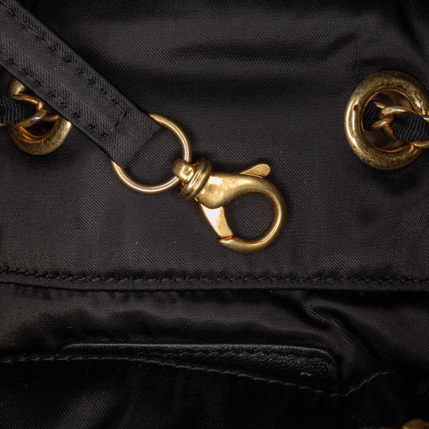 Chanel Quilted Nylon Crystal CC Drawstring Sling Bag