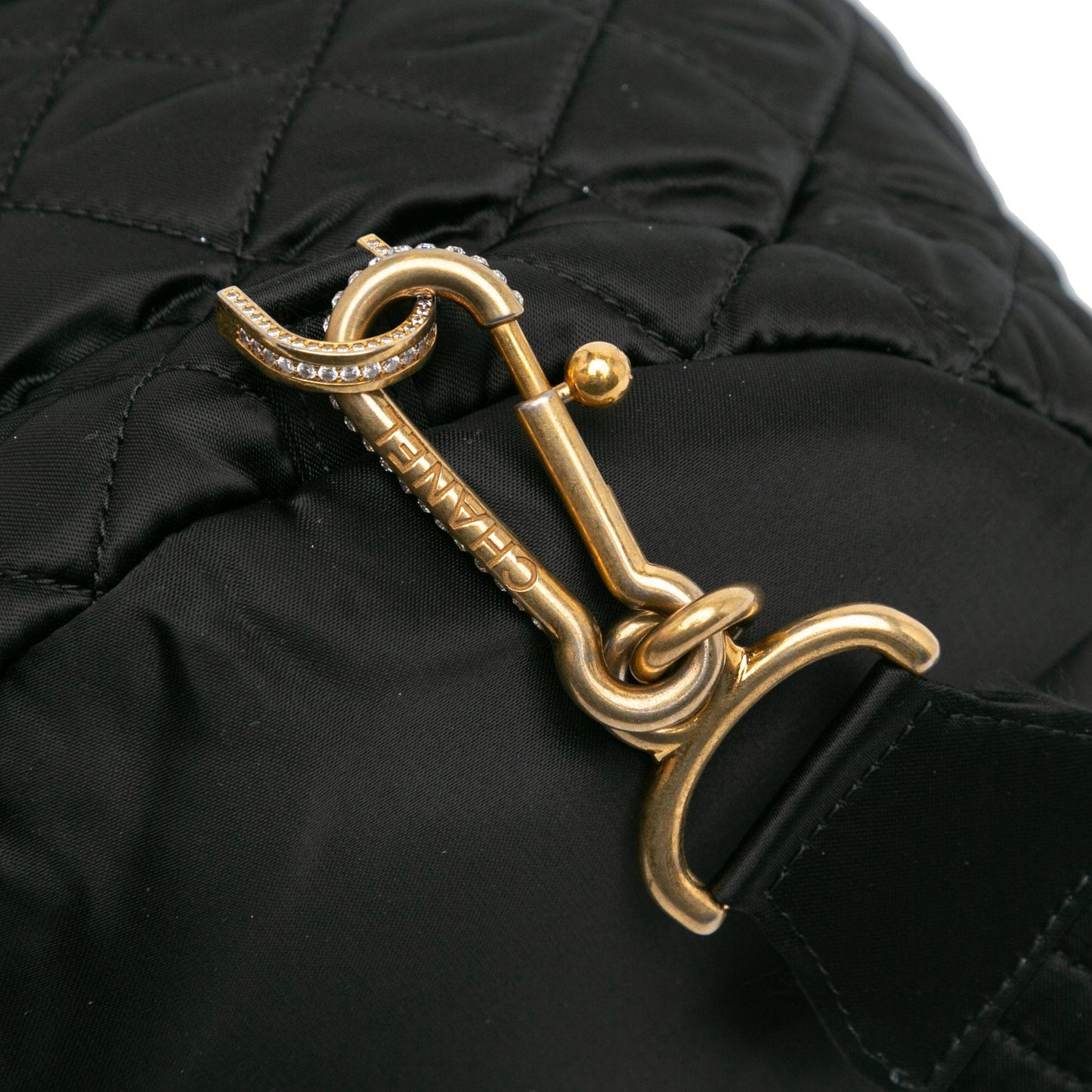 Chanel Quilted Nylon Crystal CC Drawstring Sling Bag