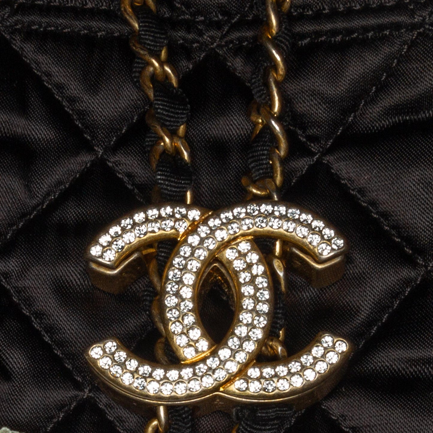 Chanel Quilted Nylon Crystal CC Drawstring Sling Bag