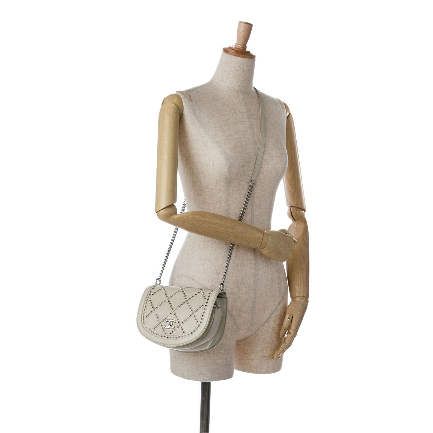 Chanel Small Calfskin Coco Eyelets Round Flap (SHG-J36UdW)