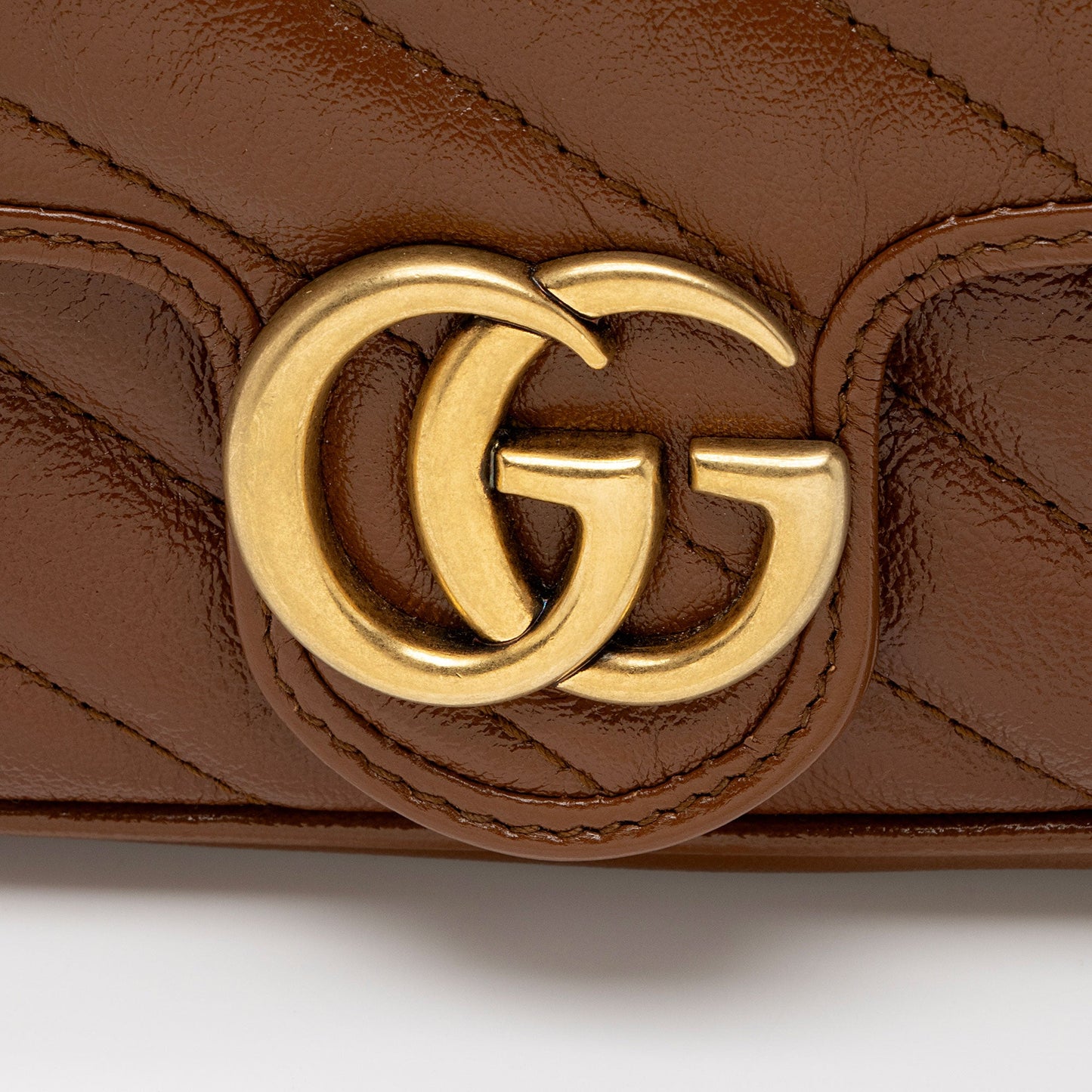 Gucci Matelasse Leather GG Marmont Super Mini Flap Bag (SHF-OIMhbP)