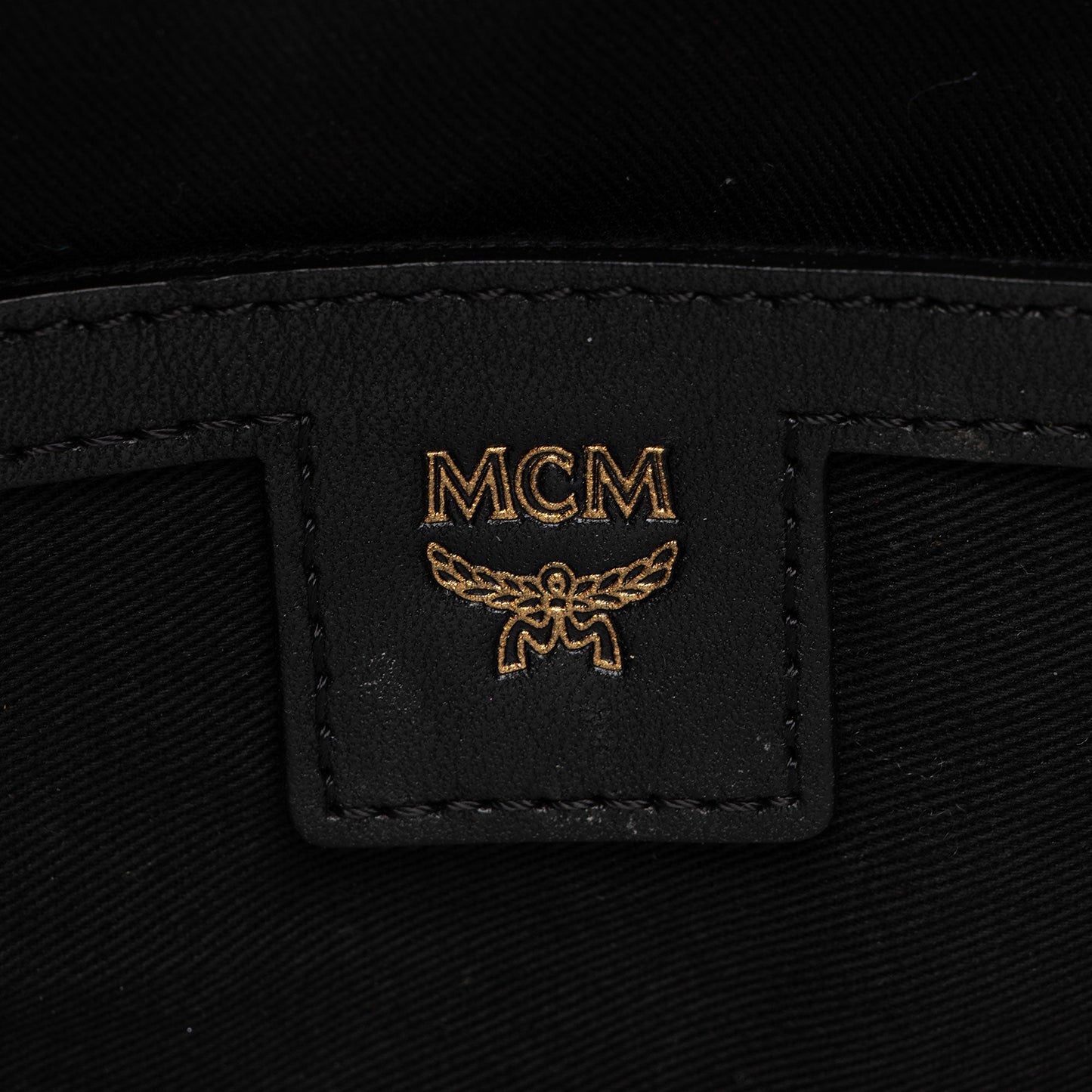 MCM Embossed Leather Studded Odeon Small Backpack