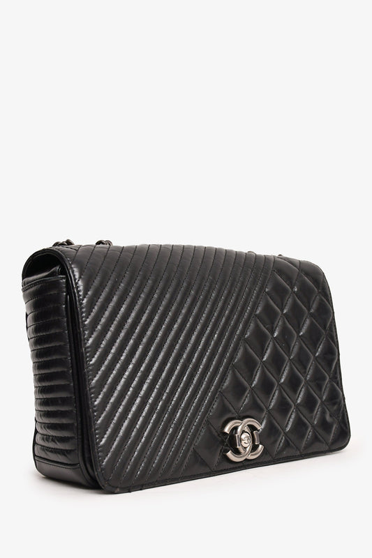 Pre-Loved Chanel™ 2014 Black Glazed Leather Coco Boy Flap Bag