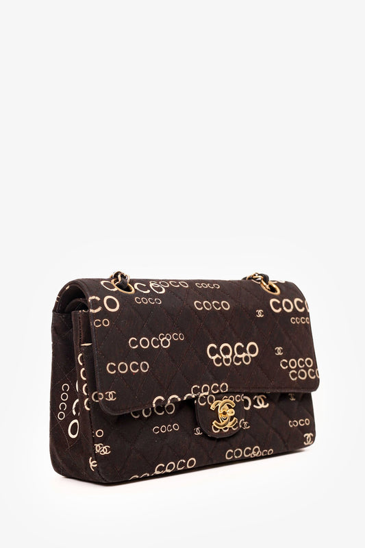 Pre-Loved Chanel™ 2002-03 Black/White Denim Quilted Coco Print Medium Double Flap Bag
