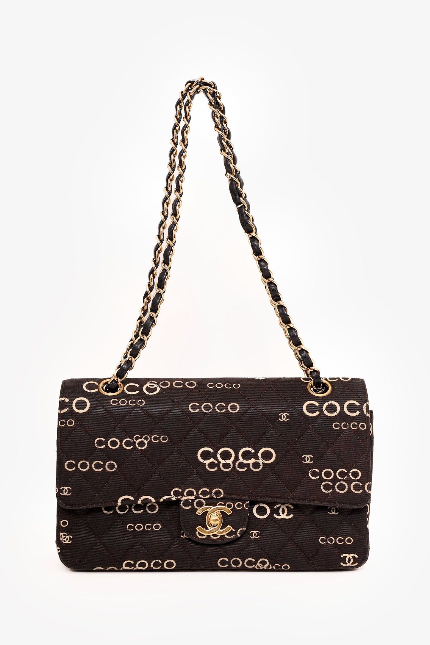 Pre-Loved Chanel™ 2002-03 Black/White Denim Quilted Coco Print Medium Double Flap Bag