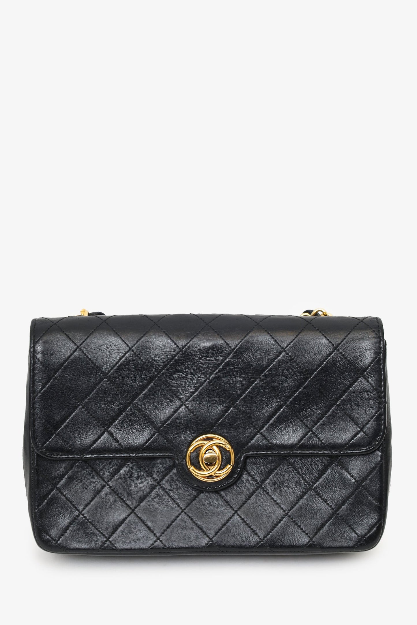 Pre-Loved Chanel™ 1986-88 Black Quilted Lambskin Circle CC Mini Flap Bag