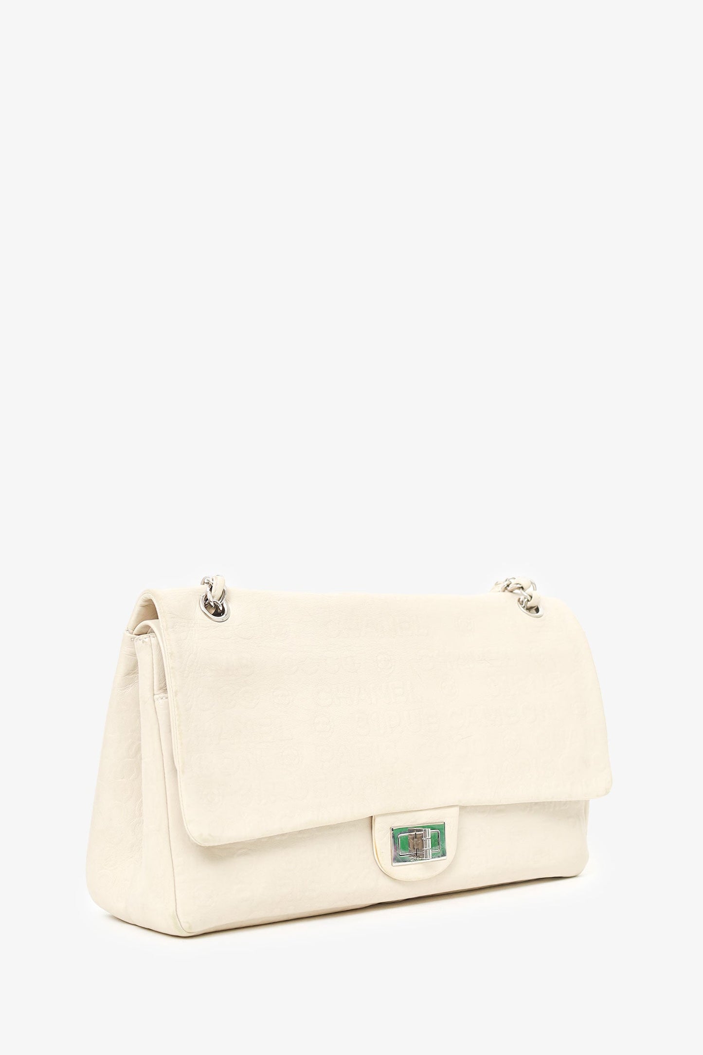 Pre-loved Chanel™ 2008-09 White Embossed CC Calfskin Unlimited Reissue 228 Flap Bag