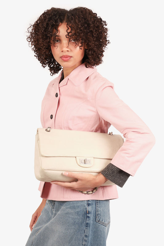 Pre-loved Chanel™ 2008-09 White Embossed CC Calfskin Unlimited Reissue 228 Flap Bag